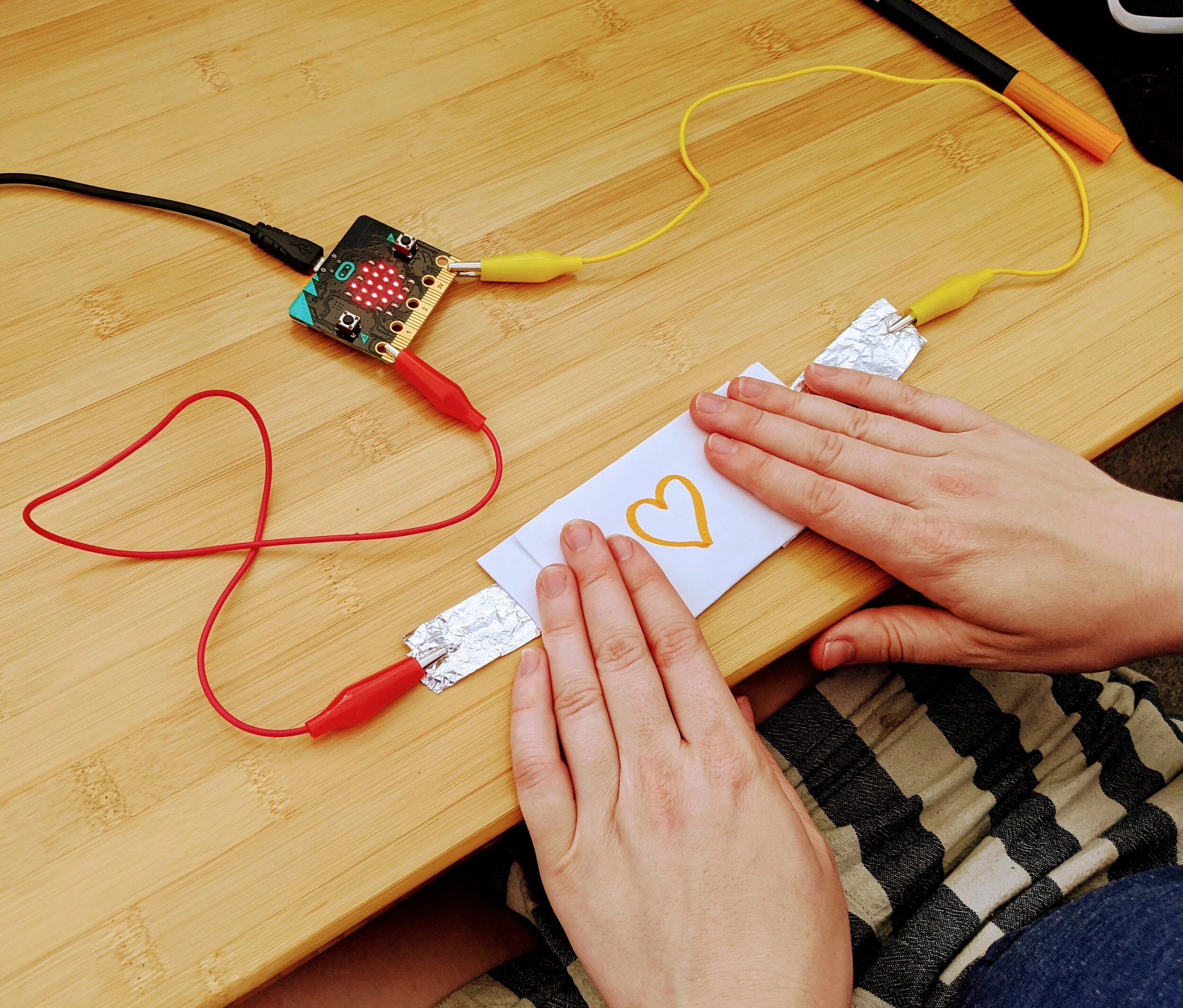 Students collaborating during a technology workshop
